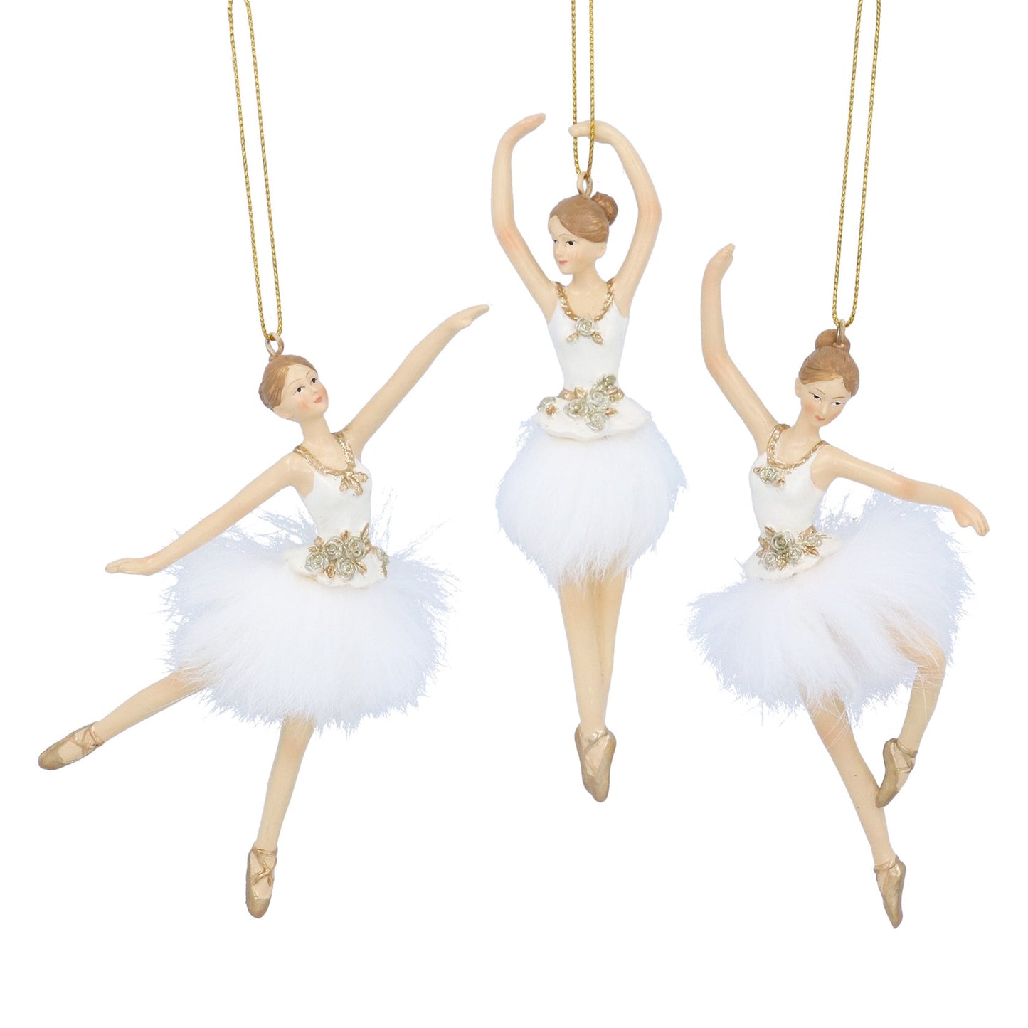 Three ballerina figurines in white tutus with gold accents on a white background