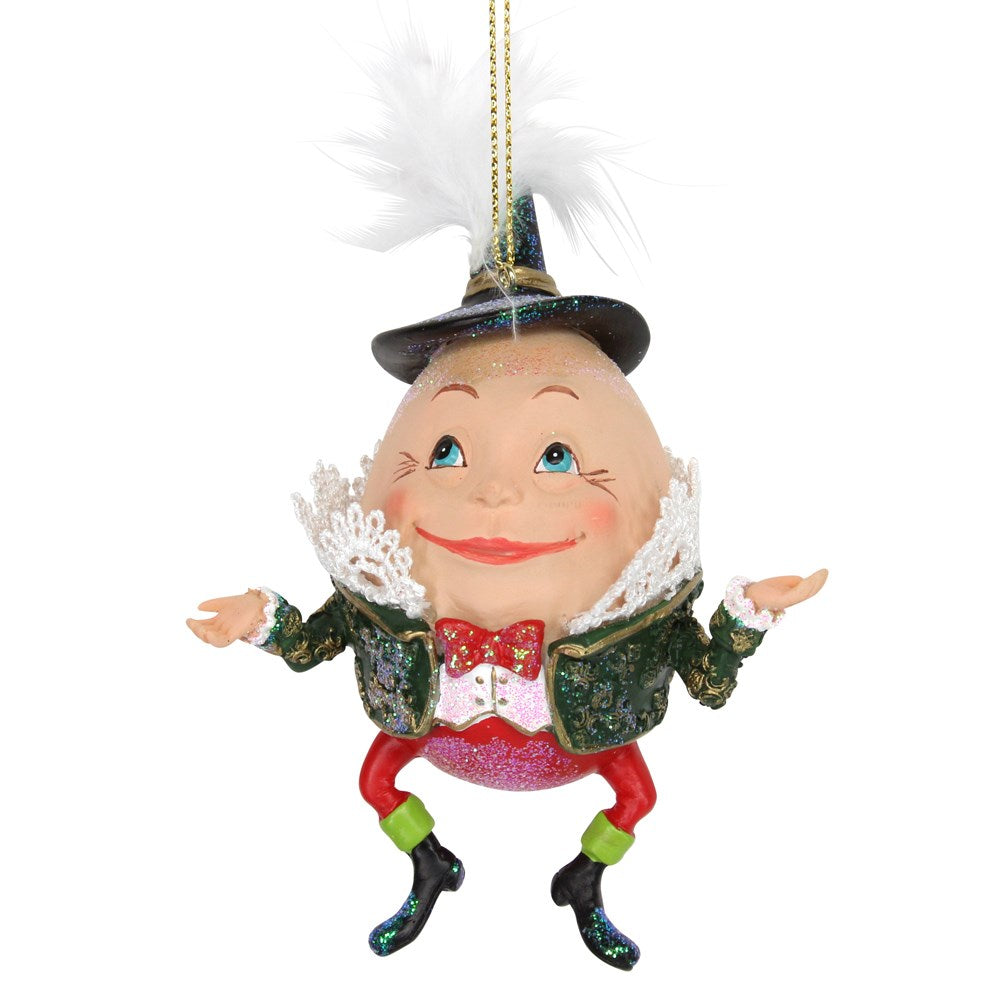 A hanging decoration featuring the character Humpty Dumpty from a Christmas tree, with a green jacket, lace collar, and a feather on top.