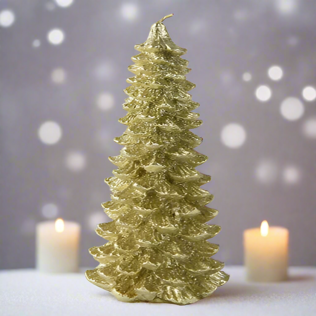 Gold Christmas tree-shaped candle with two lit candles on a gray background