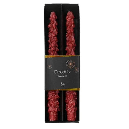 A set of two red metallic Christmas tree design dinner candles packaged in a black box with a decorative label.