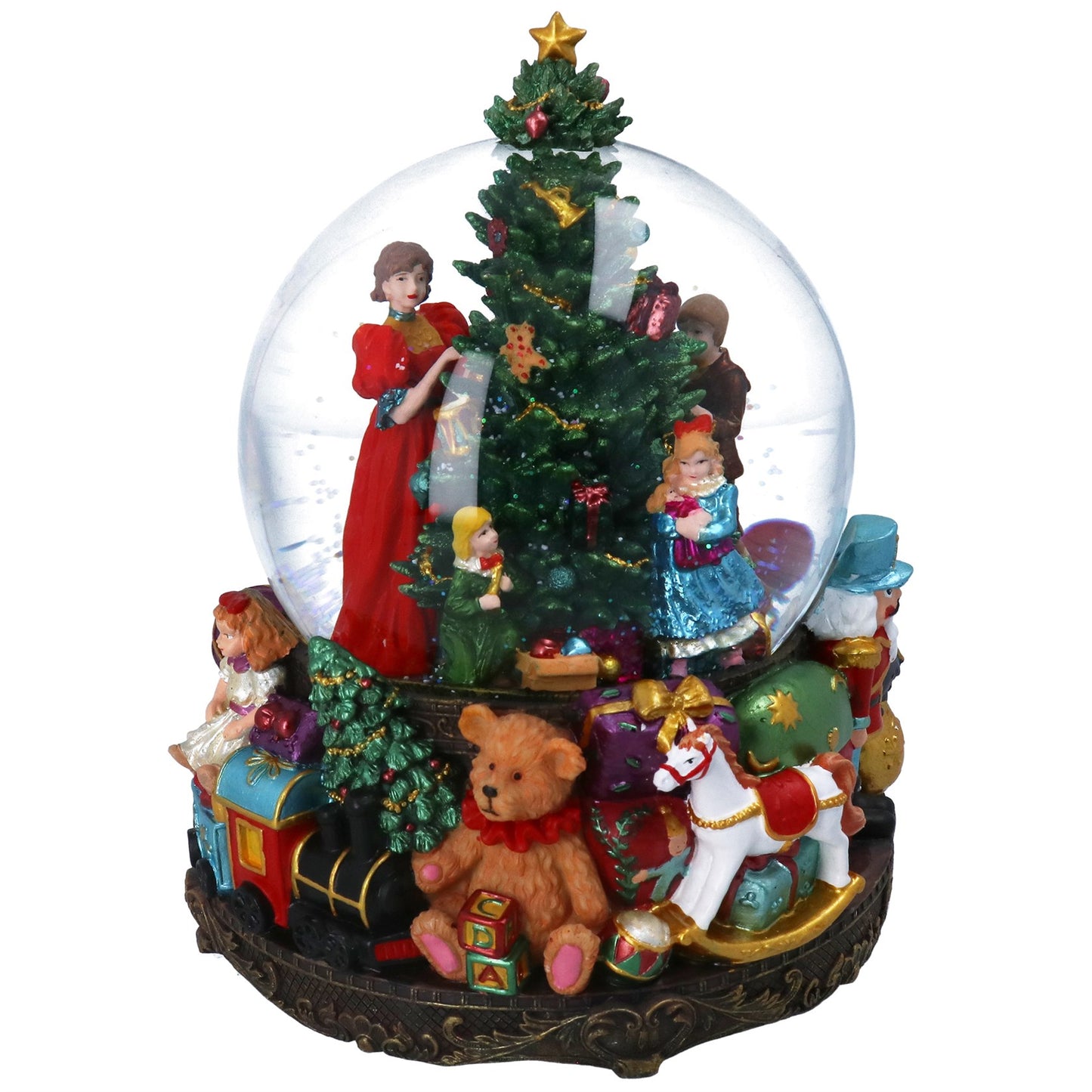 Decorative Christmas snow globe with a tree, toys, and figures inside.
