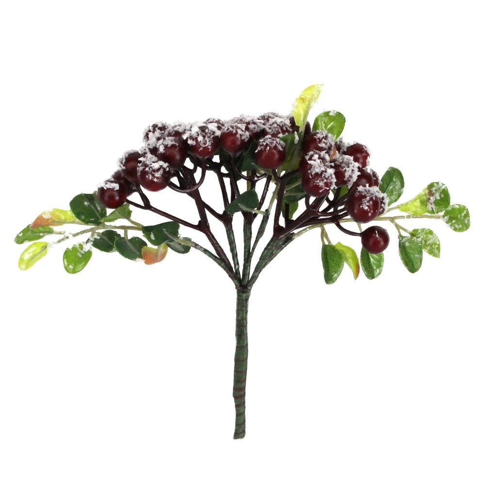 Artificial berry branch with green leaves and red berries on a white background