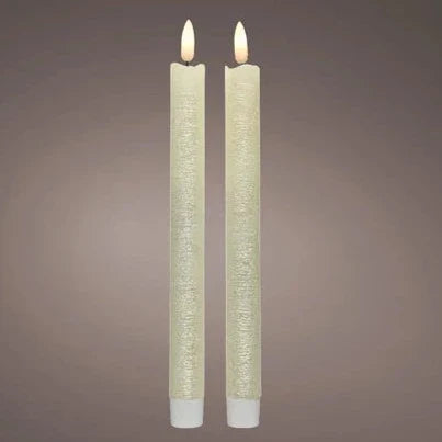 Picture image of two tall pearlized, dinner candles with LED wicks.