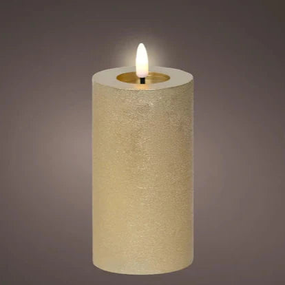 A gold-colored LED wax candle with a flat top and warm white light, 15cm in height.