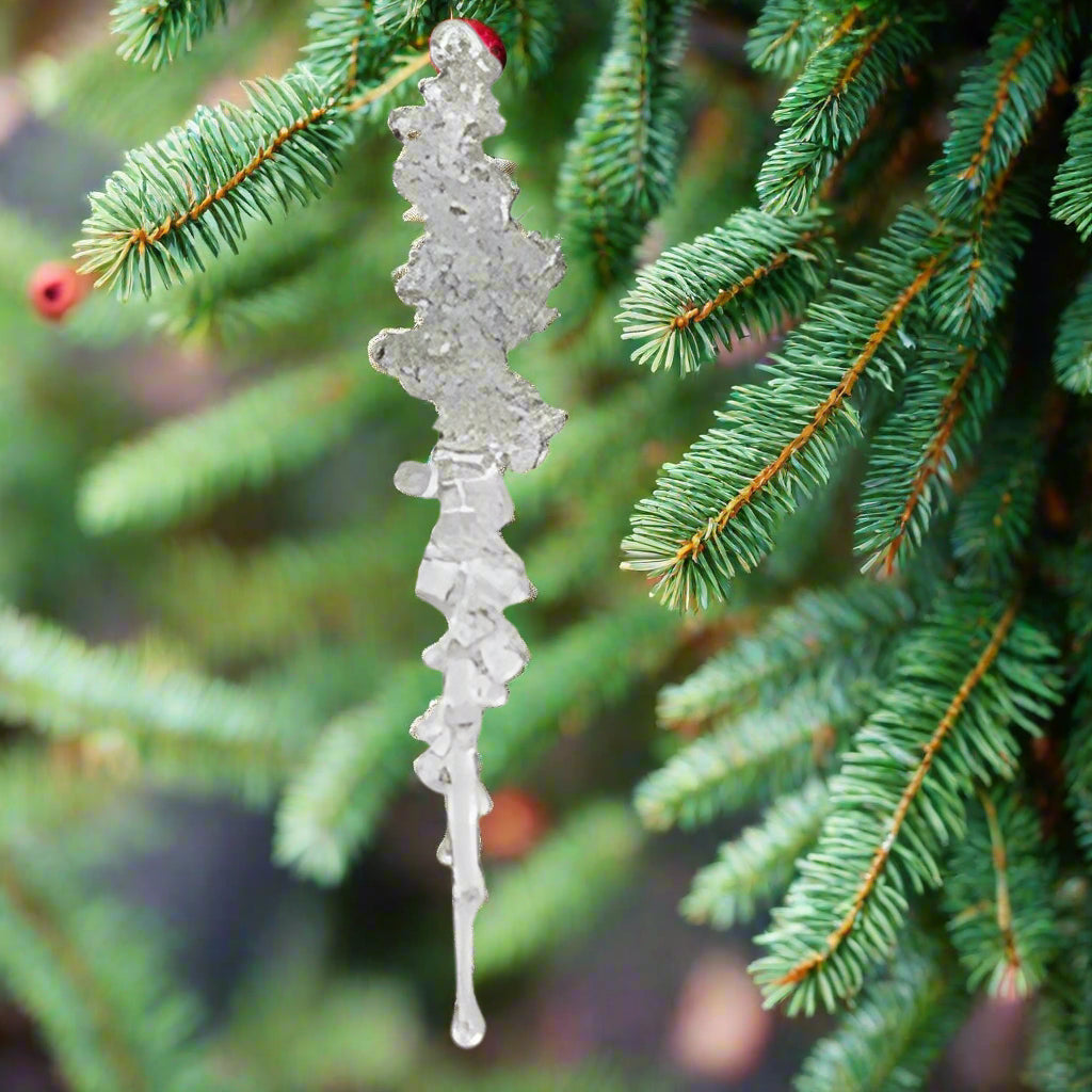 Decorative silver branch on a white background