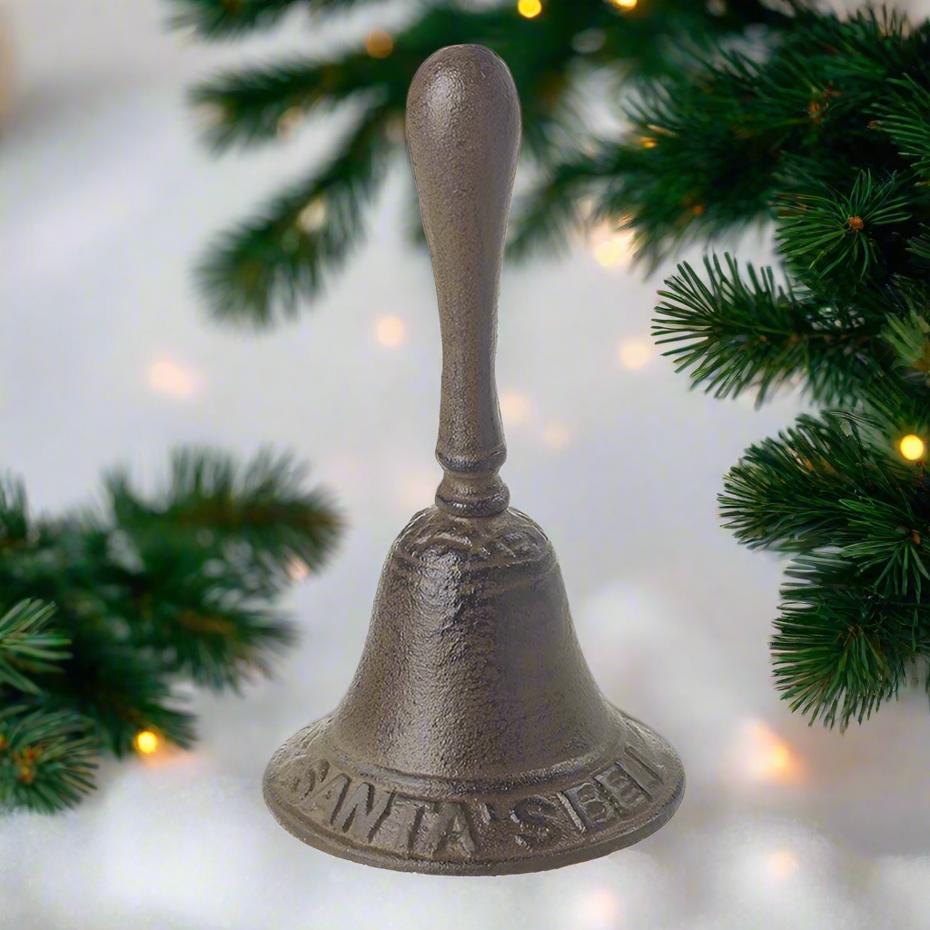 A brown metal bell with the text 'SANTA'S BELL' cast on the surface.