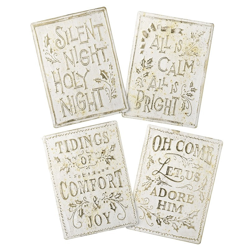 A set of four cream and gold aged effect Christmas signs with different texts, including 'Silent Night', 'All is Calm', 'Tidings of Comfort', and 'Oh Come Let us Adore Him'.