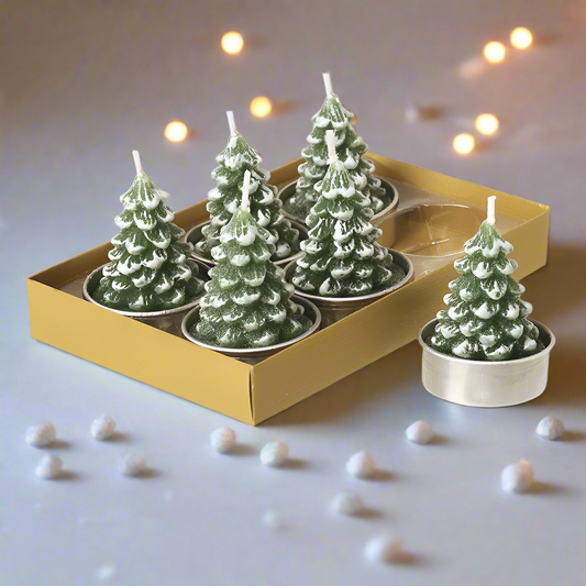 A set of 6 green Christmas tree-shaped tea lights in a yellow box.