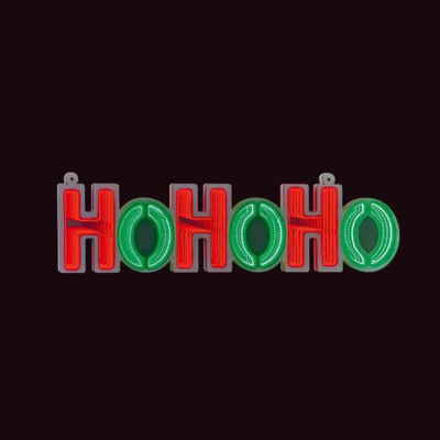 Neon sign with 'HO HO HO' text on a black background