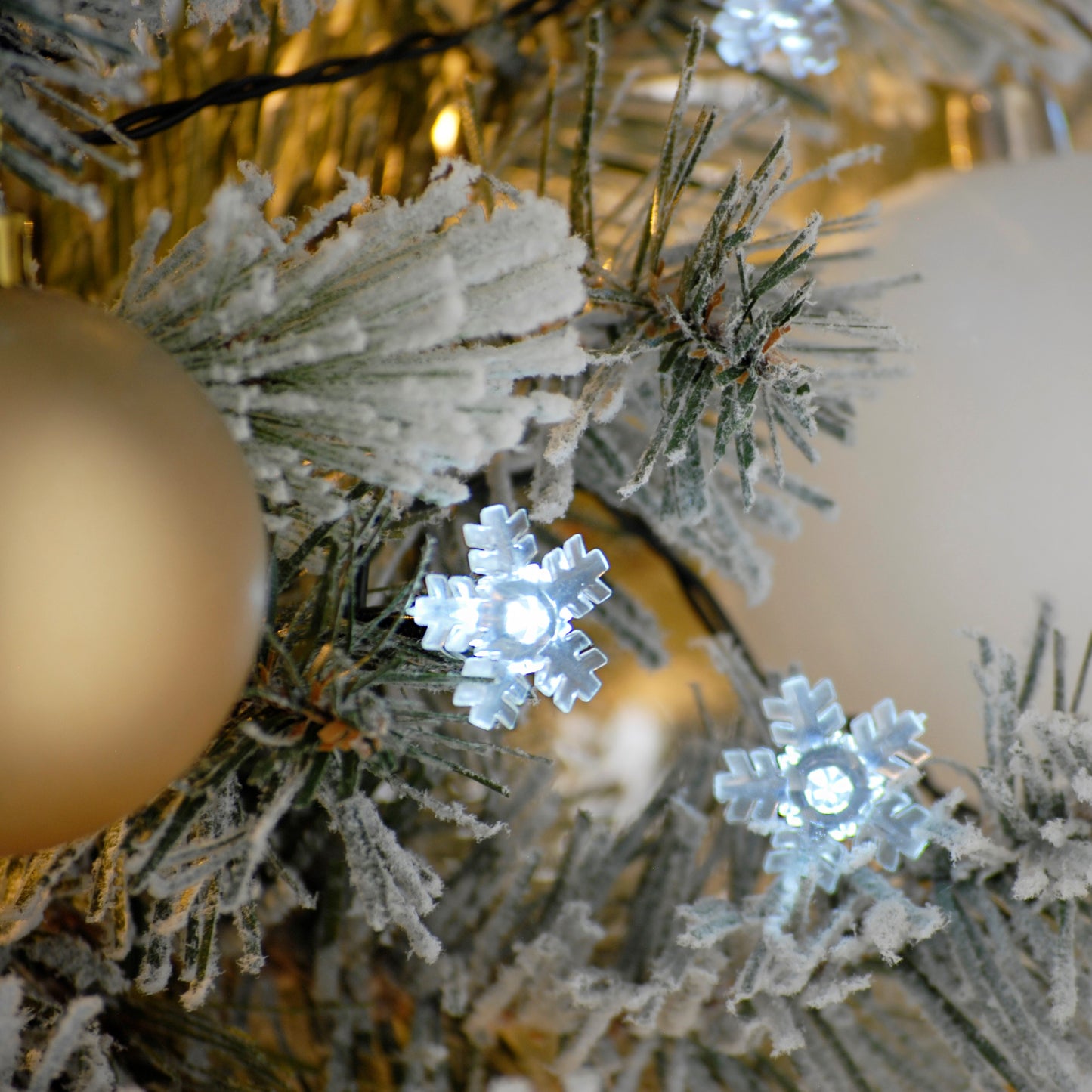 Festive 100 White Snowflake Battery Operated Christmas String Lights