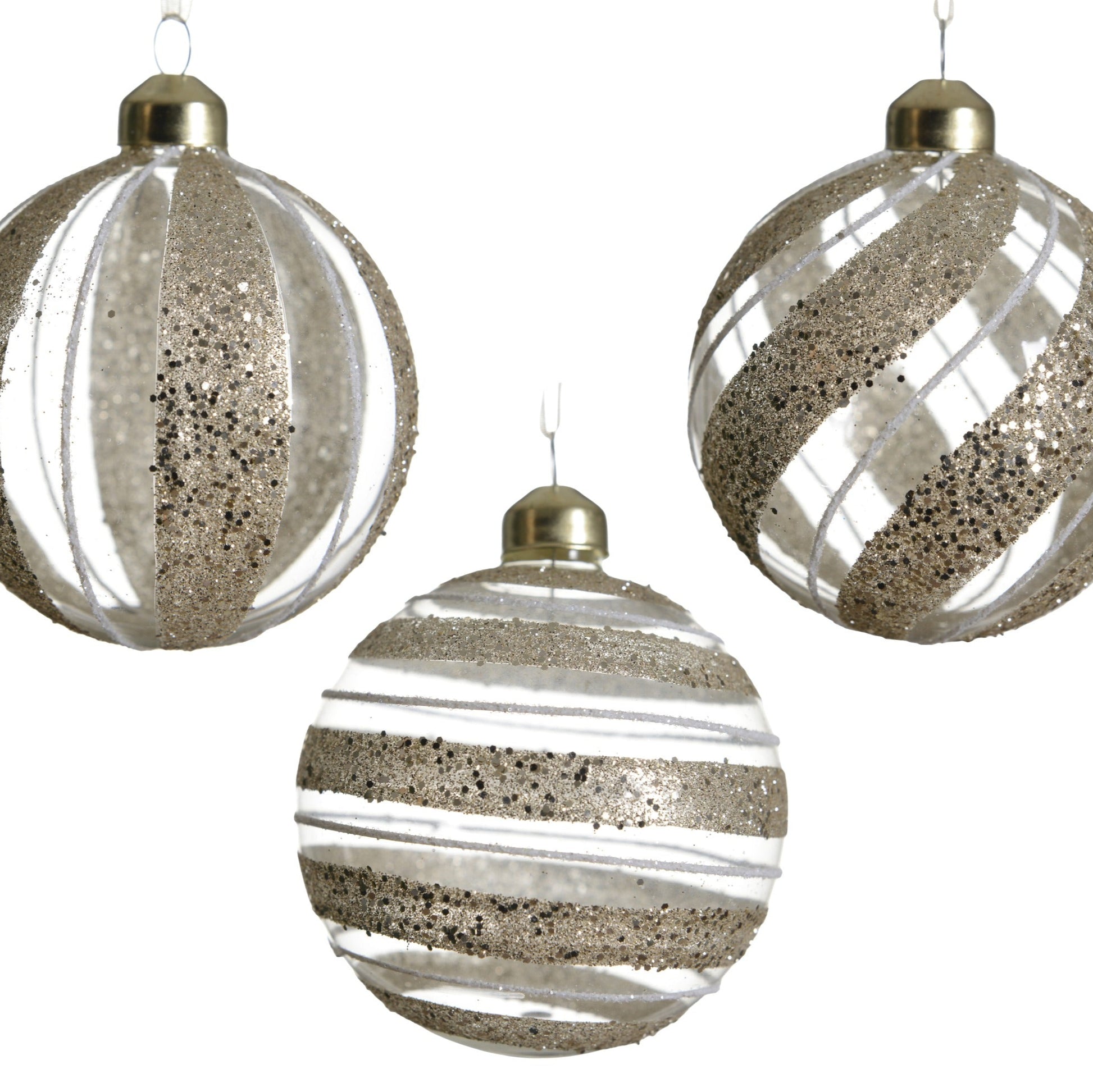 Three decorative glass balls with metallic finishes on a white background