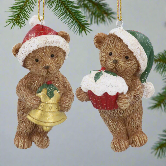 Two Christmas-themed teddy bear ornaments on a white background