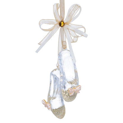 Crystal ballet slipper ornament with gold glitter and a white ribbon on a white background