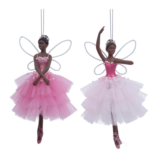 Two fairy figurines in pink and white dresses with wings on a white background