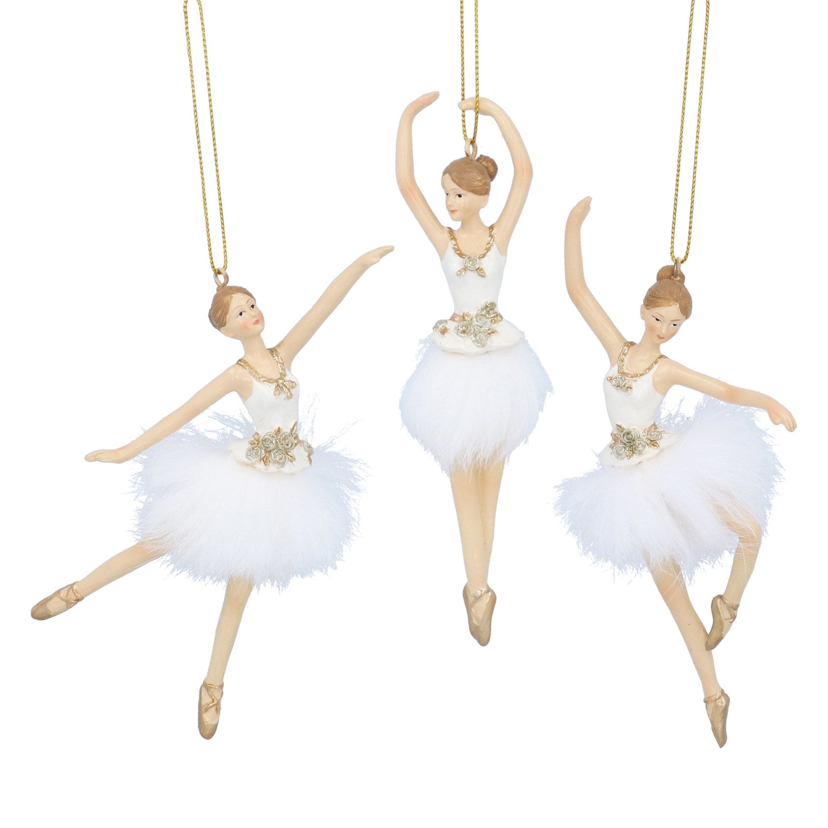 Three ballerina figurines in white tutus with gold accents on a white background
