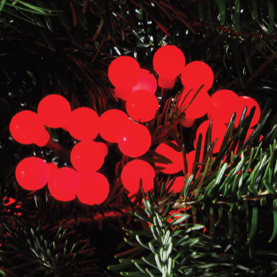 Red berry LED lights on a Christmas tree