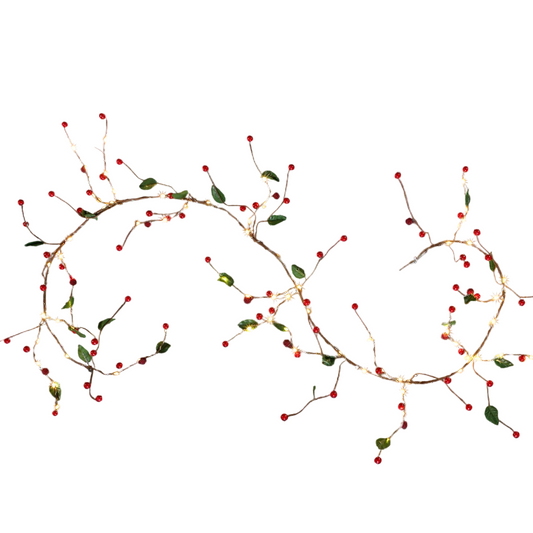 Decorative string lights with red berries and green leaves on a white background