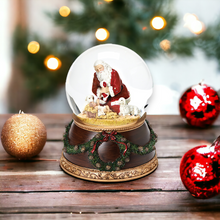 Load image into Gallery viewer, Christmas Snow Globe with Santa and Baby Jesus Scene
