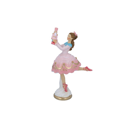 A resin ornament depicting a female figure in a pink tutu with a nutcracker, intended as a Christmas decoration.