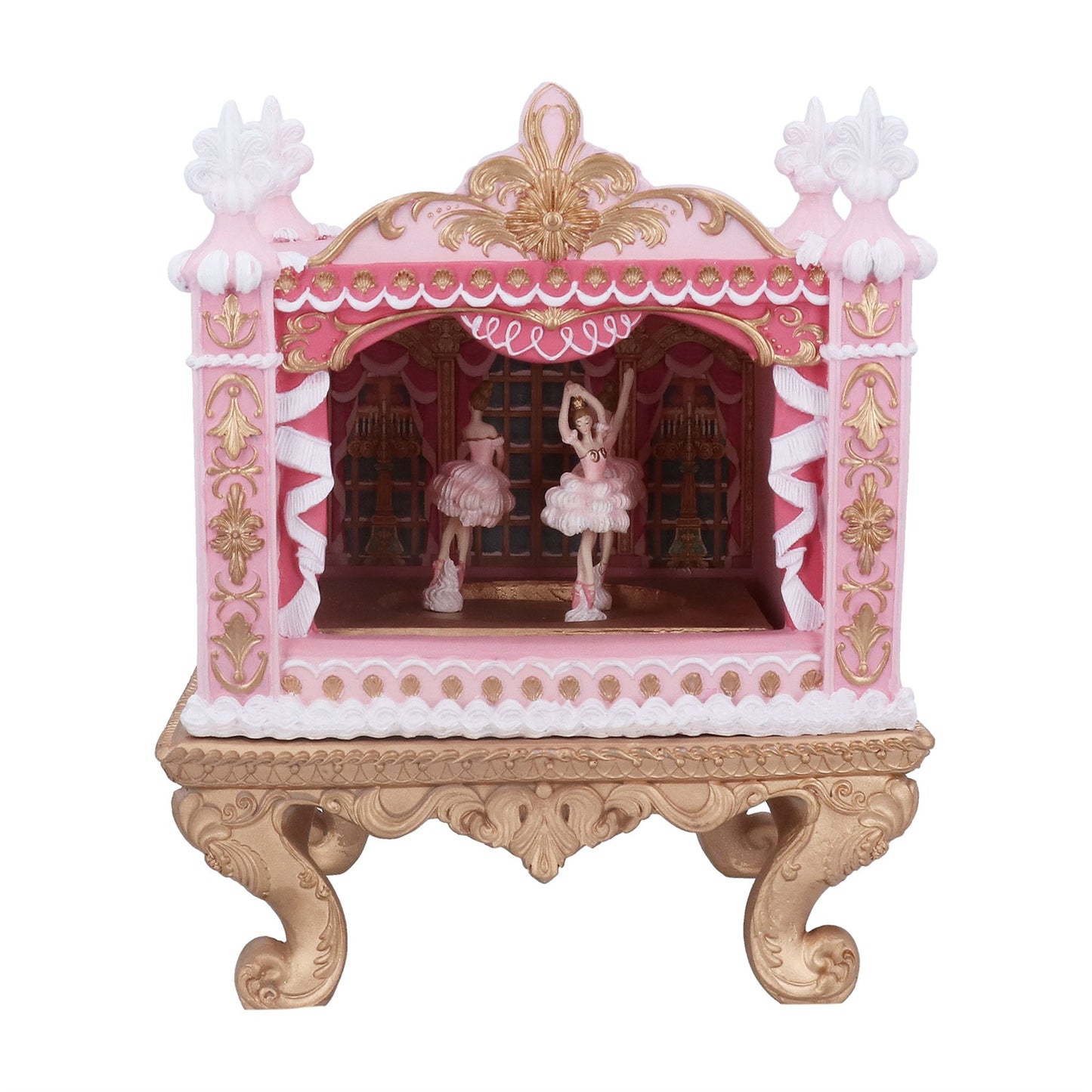 Decorative pink and gold cabinet with ballerina figurines on a white background