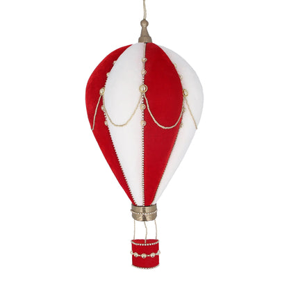 A red and white Christmas-themed hot air balloon wall plaque decoration with gold accents and a textured surface, hanging against a white background.