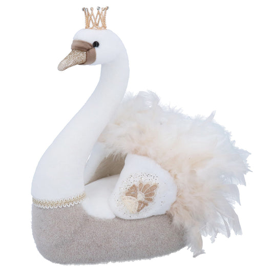 Plush swan with a crown on a white background