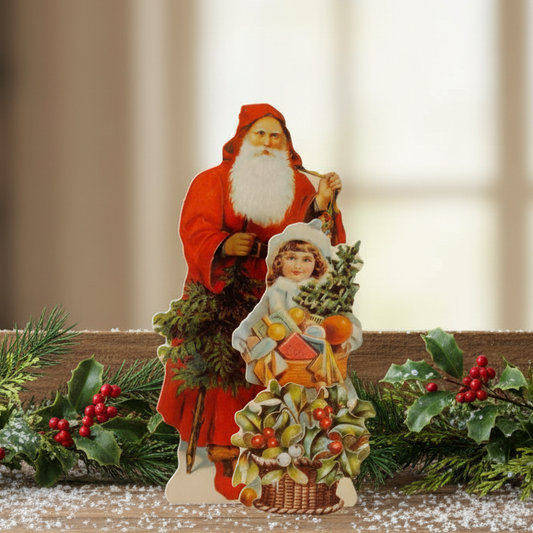 A 3D Christmas card featuring an illustration of Father Christmas and a little girl, with a Christmas tree and gifts in the background.