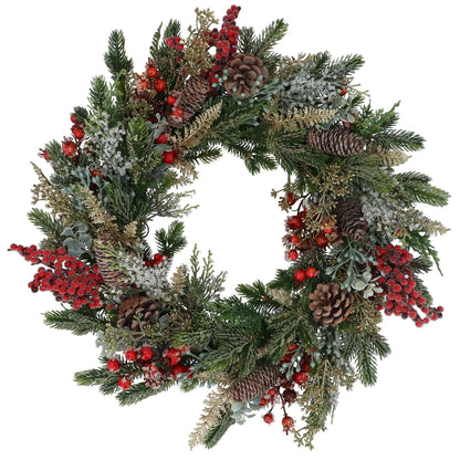 Christmas wreath with greenery, red berries, and pinecones on a white background