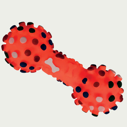 Red and black textured dog toy on a light gray background