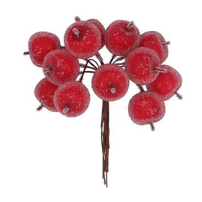 A bunch of frosted red artificial mini apples with a metallic stem, used for Christmas decoration.