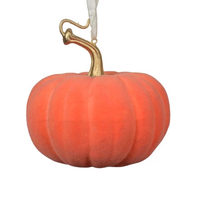 Decorative pumpkin with a gold stem on a white background