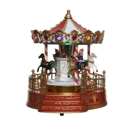 A decorative Christmas musical carousel with multicolored LED lights, featuring figures of horses and a festive design.