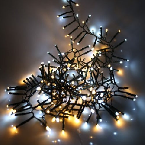 Decorative string lights shaped like a snowflake on a dark background