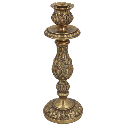 Decorative brass candlestick on a white background