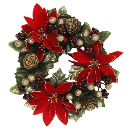 A round red poinsettia-themed candle ring with green leaves and gold accents.