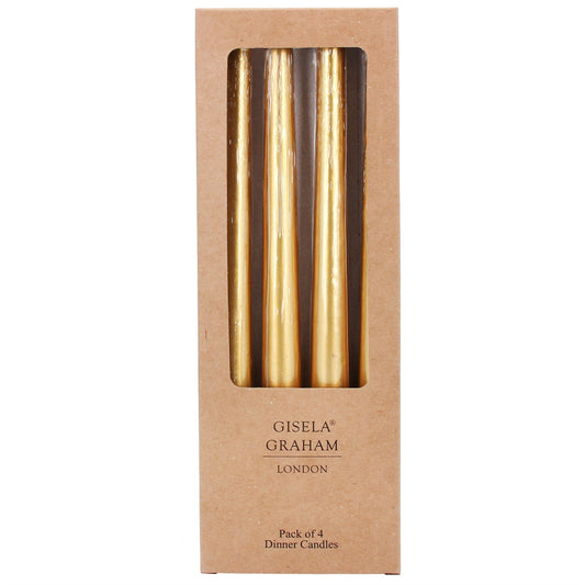 Pack of 4 gold dinner candles in a Gisele Graham London box on a white background