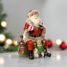 Load image into Gallery viewer, Santa with Traditional Christmas Toys Ornament

