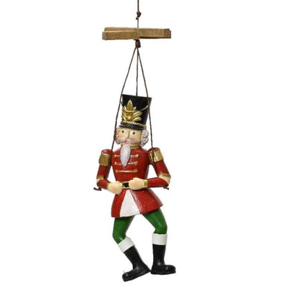 hanging puppet nutcracker ornament dressed in black top hat and red jacket