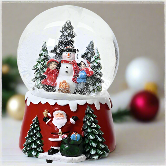 Christmas-themed snow globe with Santa Claus, snowman, and trees on a white background