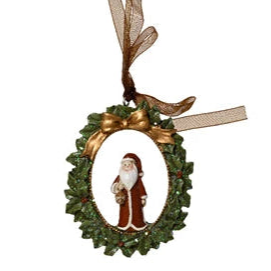 Decorative ornament with Santa Claus figure in a wreath on a white background