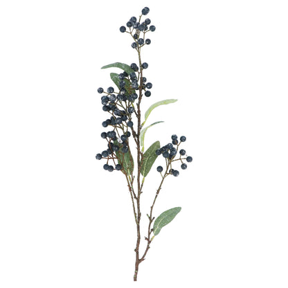 Artificial plant branch with blue berries and green leaves on a white background