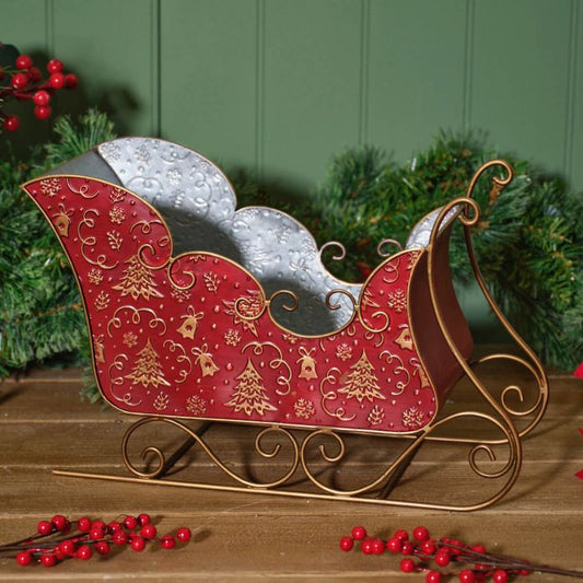 Red Sleigh Embossed with Christmas Trees and Bells