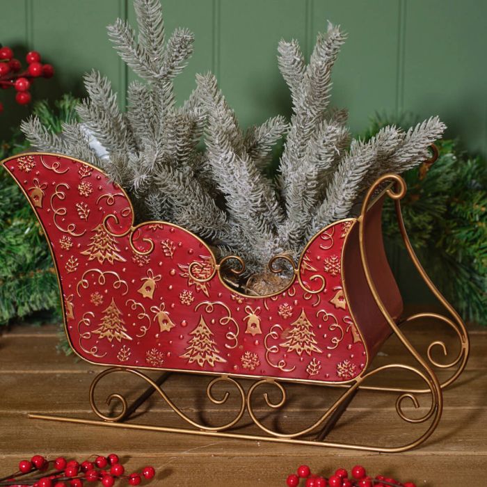 Red Sleigh Embossed with Christmas Trees and Bells