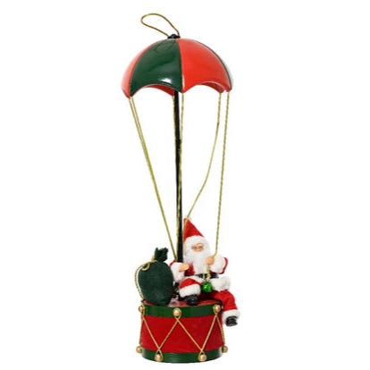 Decorative ornament of Santa Claus in a hot air balloon with a parachute on a white background