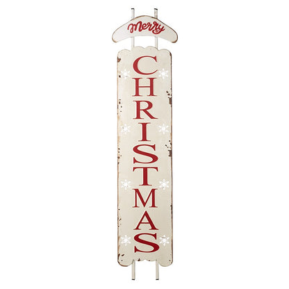A rustic white merry christmas sleigh sign with the phrase 'Merry Christmas' and snowflake decorations.