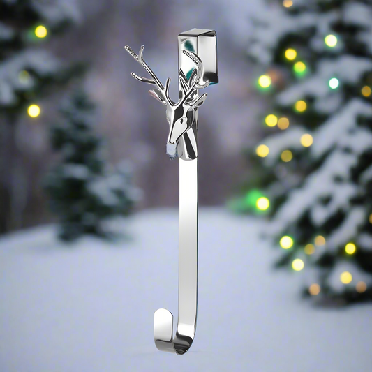A silver-colored metal wreath hanger in the shape of a stylized stag's head.