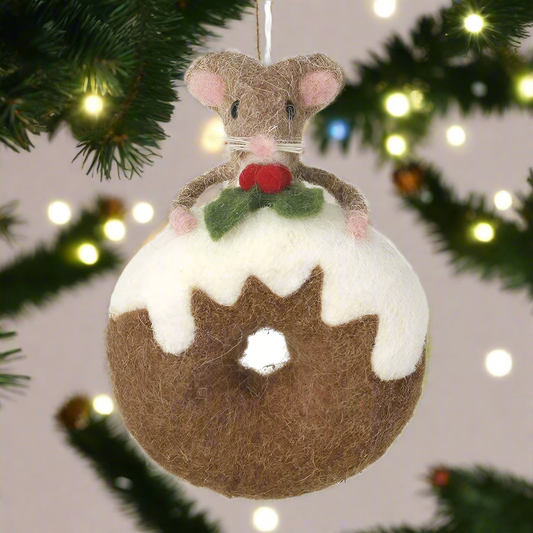 A felt ornament in the shape of a mouse sitting on a donut with white icing, decorated with a green and red detail on the mouse's hat.