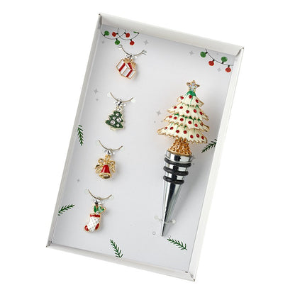 A set of wine glass charms and a bottle stopper with Christmas tree design, presented on a white background.