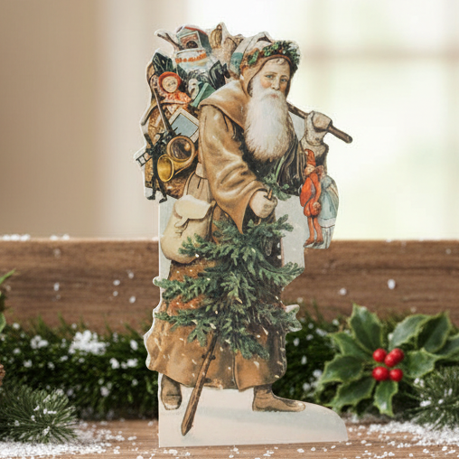 A greeting card featuring a Victorian-inspired illustration of Father Christmas with a Christmas tree and toys.