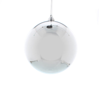 A single shiny silver shatterproof bauble hanging against a white background.
